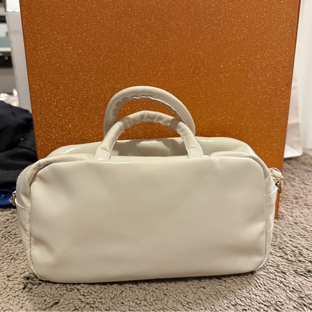 Clare V mini Claude in white patent